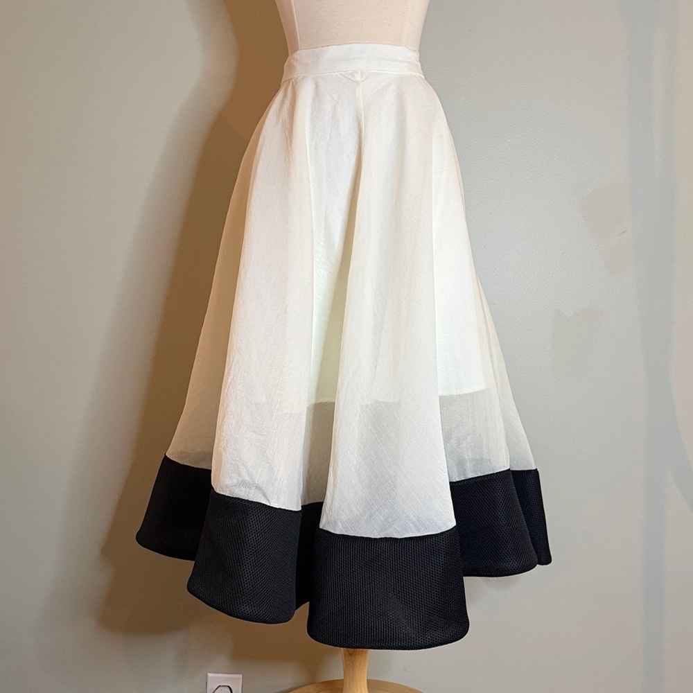 Cream Midi Circle Skirt with a Weighted Black Hem - 1950’s Style